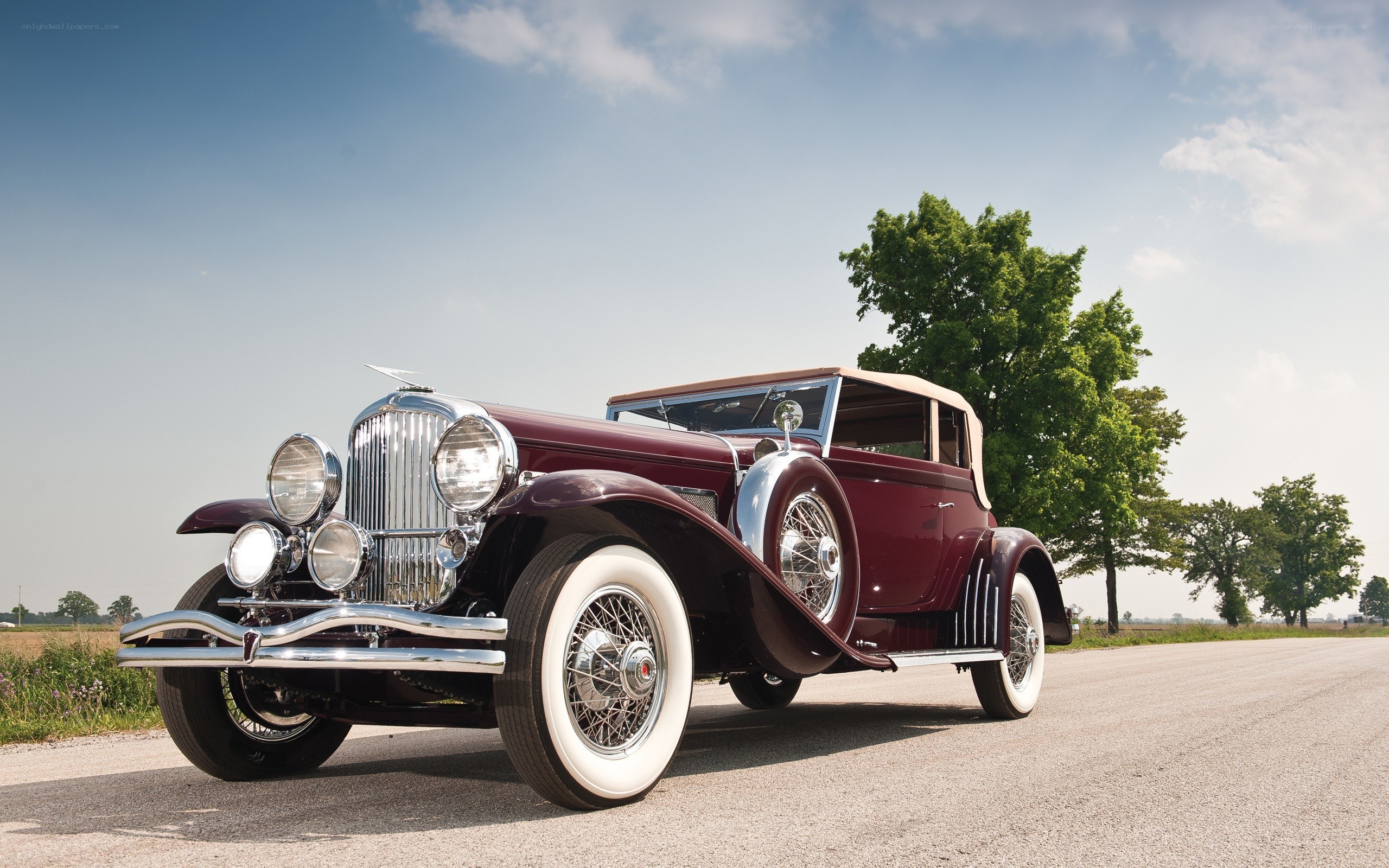 Classic maroon convertible car
