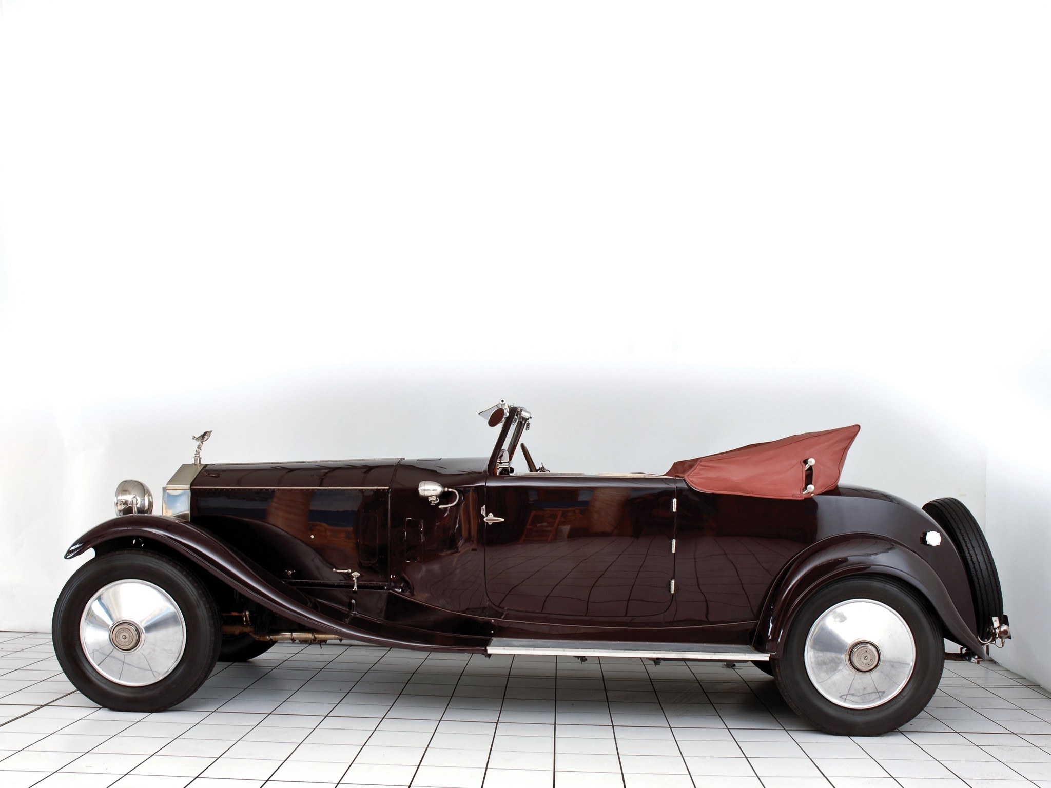 Classic maroon convertible car