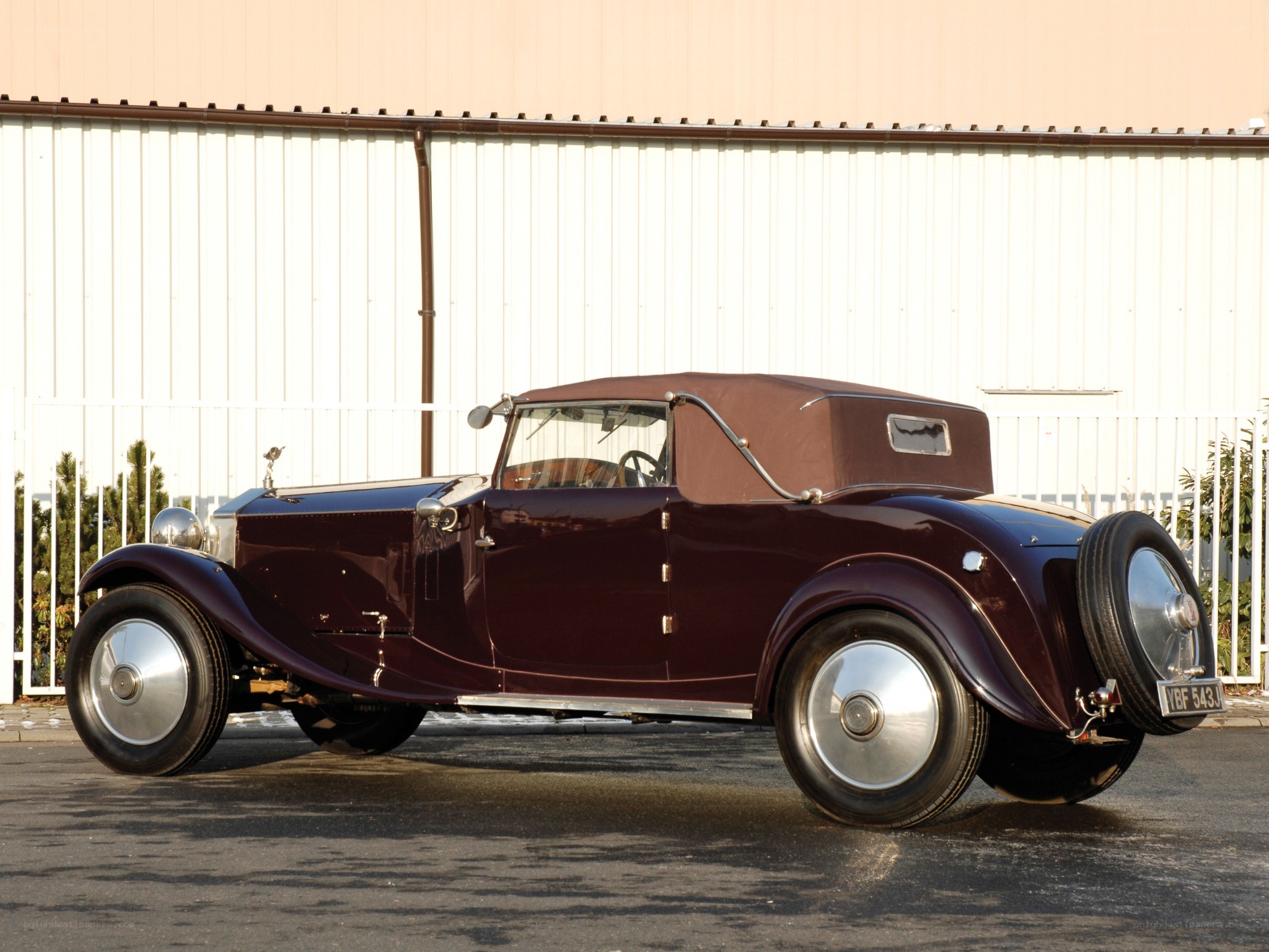 Classic maroon convertible car