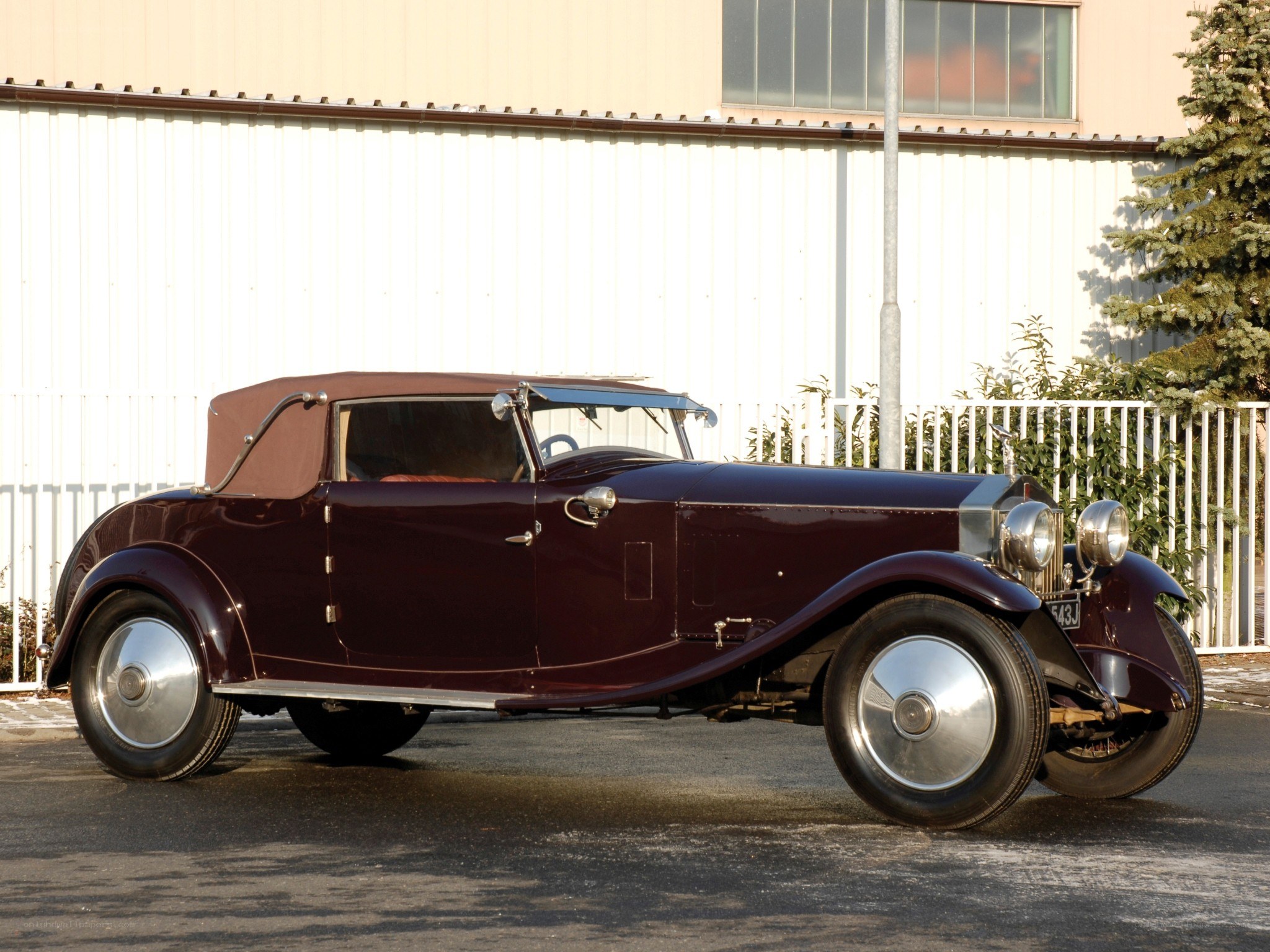 Classic maroon convertible car