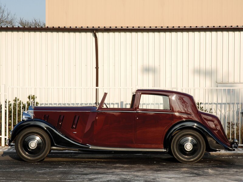 Classic maroon convertible car