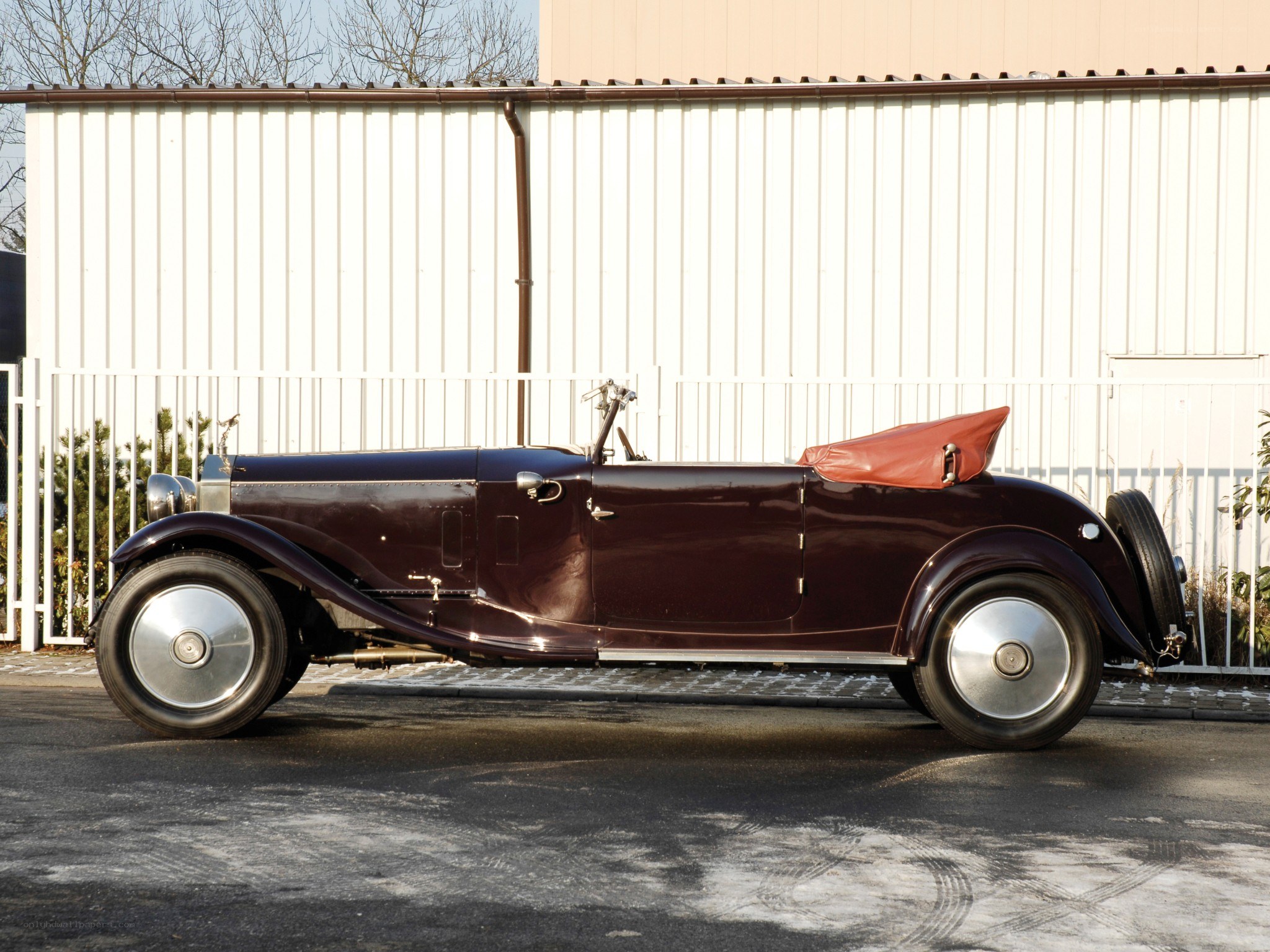 Classic maroon convertible car