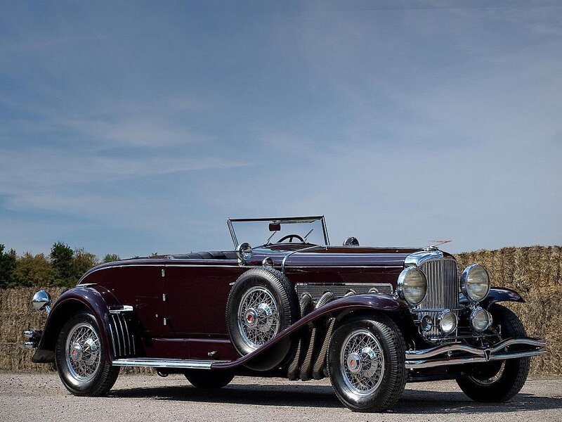 Classic maroon convertible car