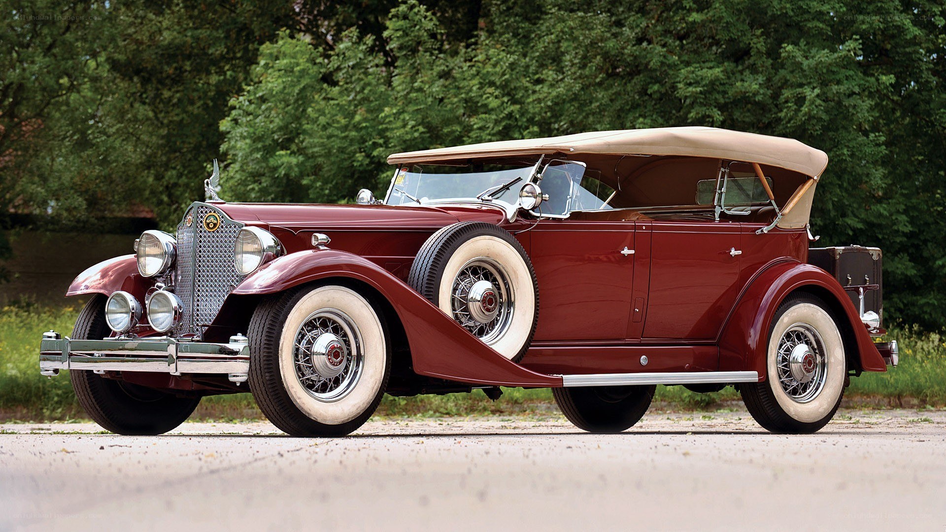 Classic maroon convertible car