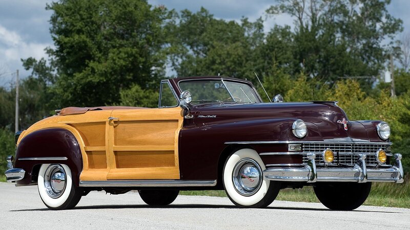 Classic maroon convertible with wood paneling