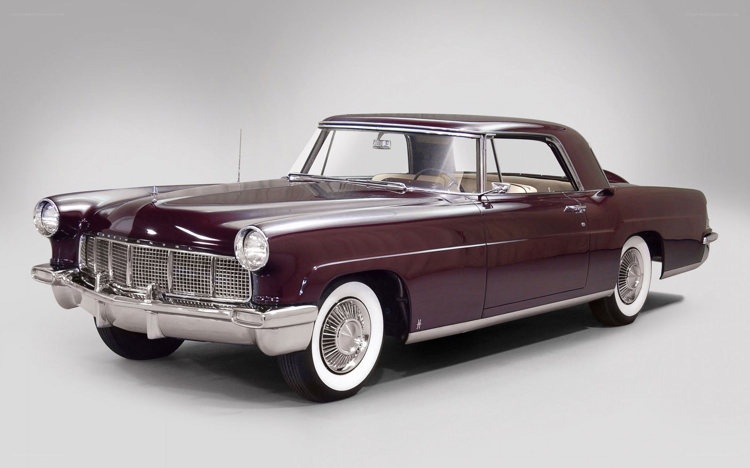 Classic maroon Lincoln sedan