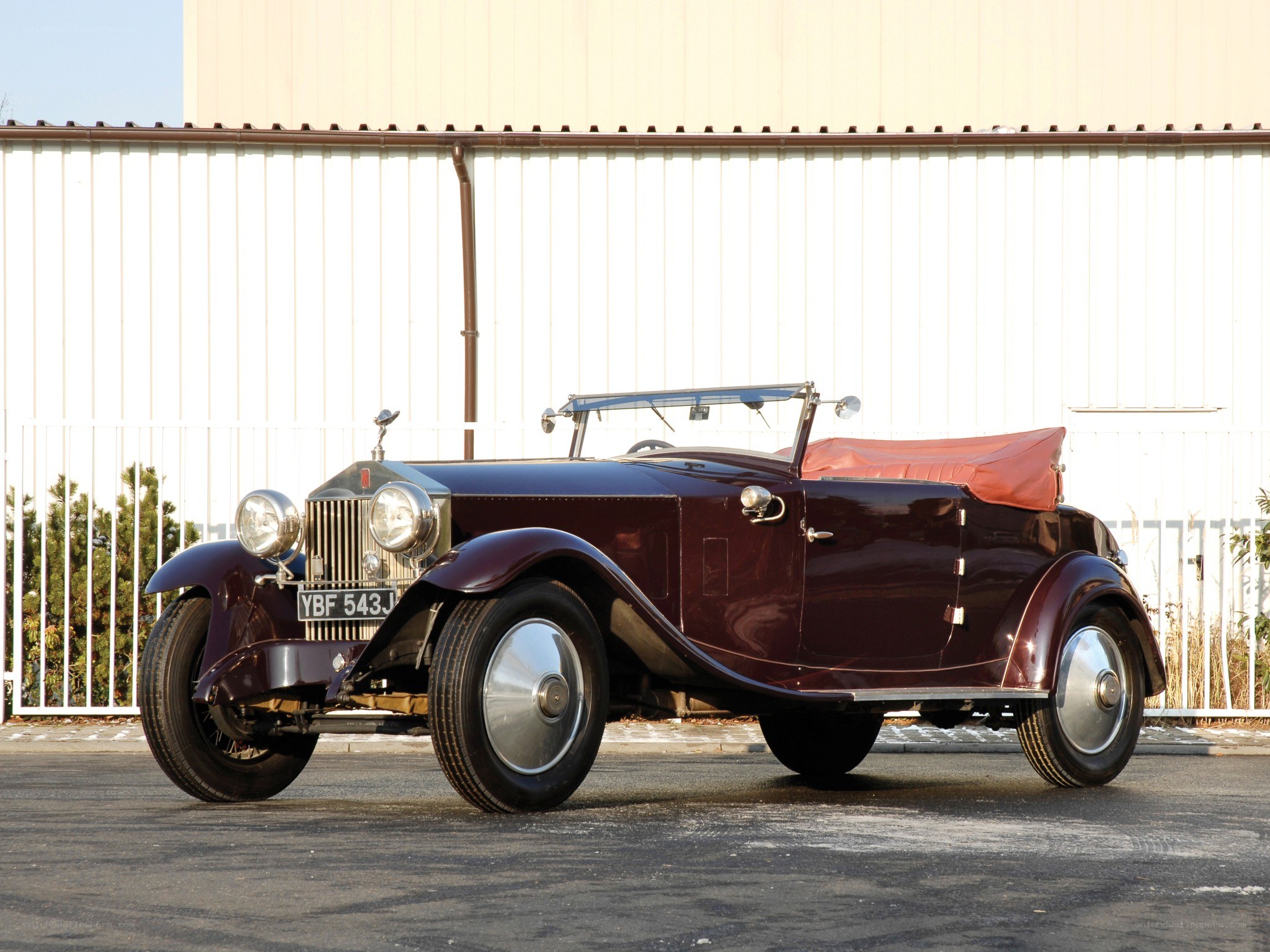 Classic maroon Rolls-Royce convertible