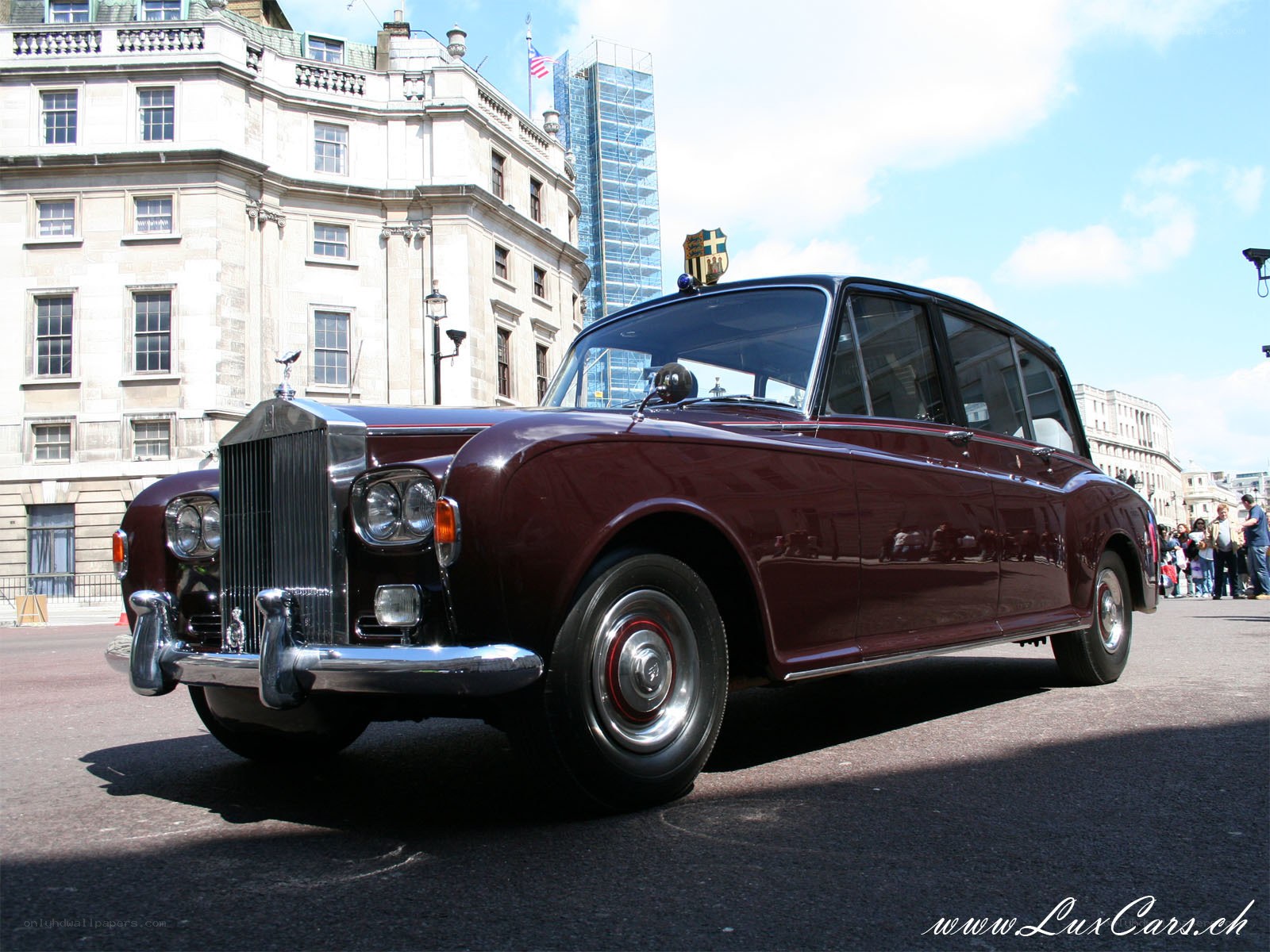 Classic maroon Rolls-Royce on display