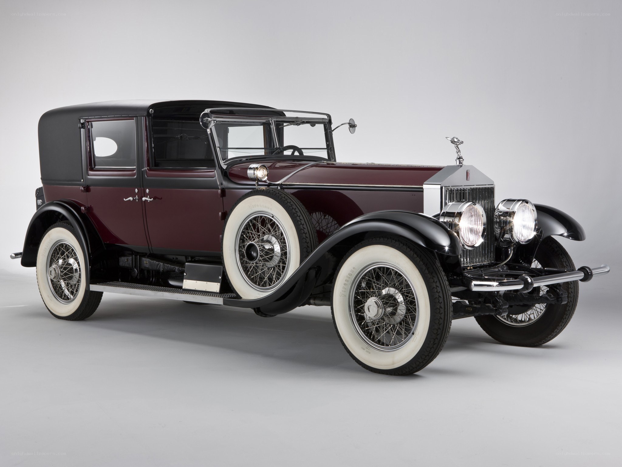 Classic maroon Rolls-Royce sedan