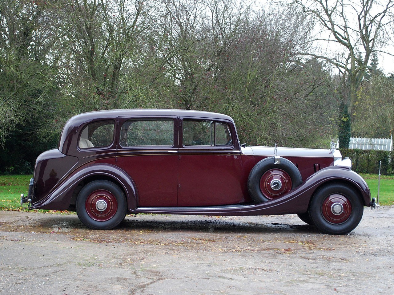 Classic maroon Rolls-Royce sedan