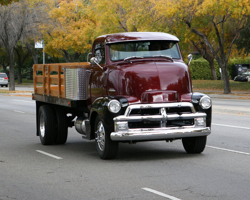 classic maroon truck on street