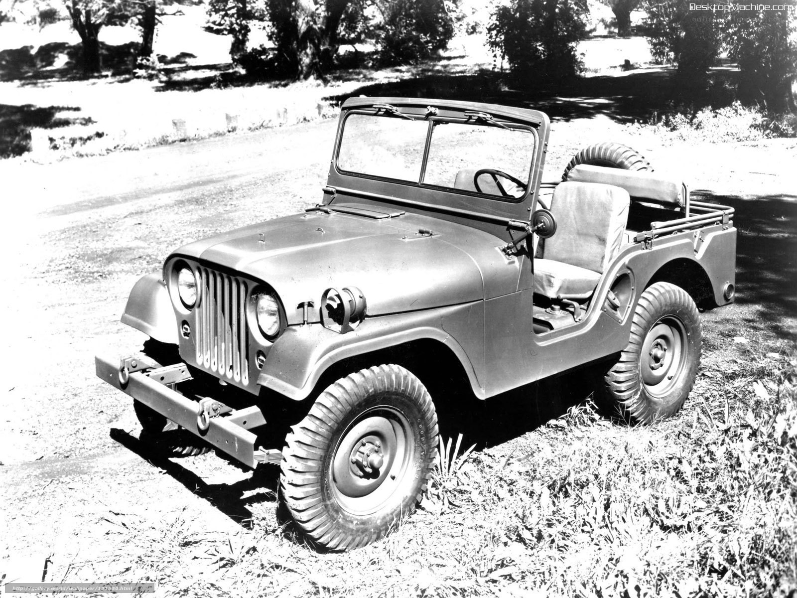 Classic military jeep on dirt road