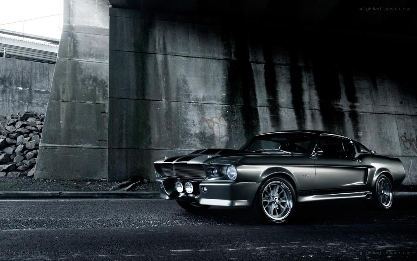 Classic muscle car under bridge