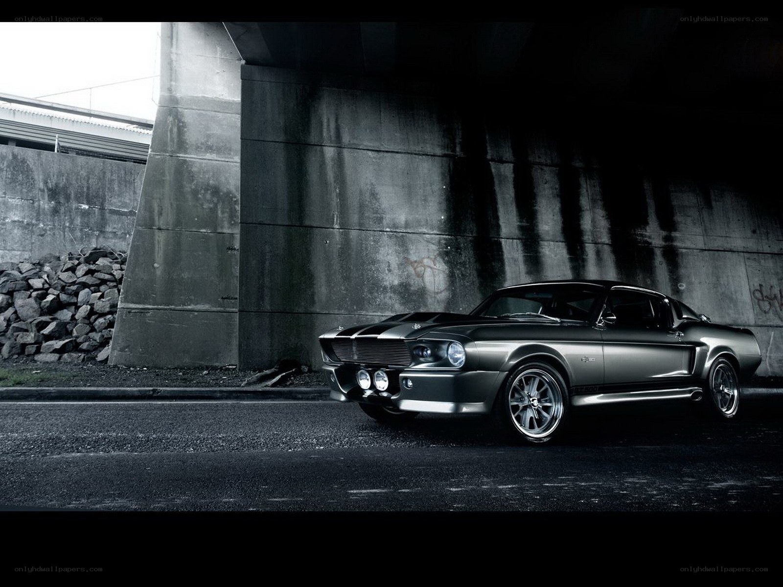 Classic muscle car under bridge