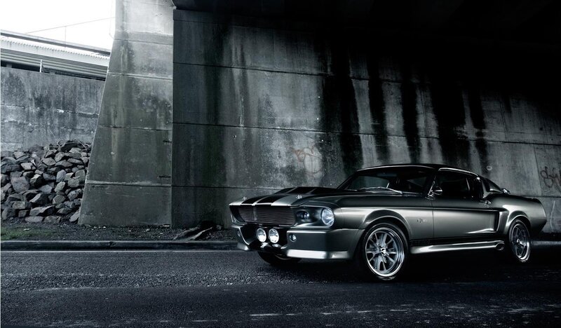 Classic muscle car under bridge