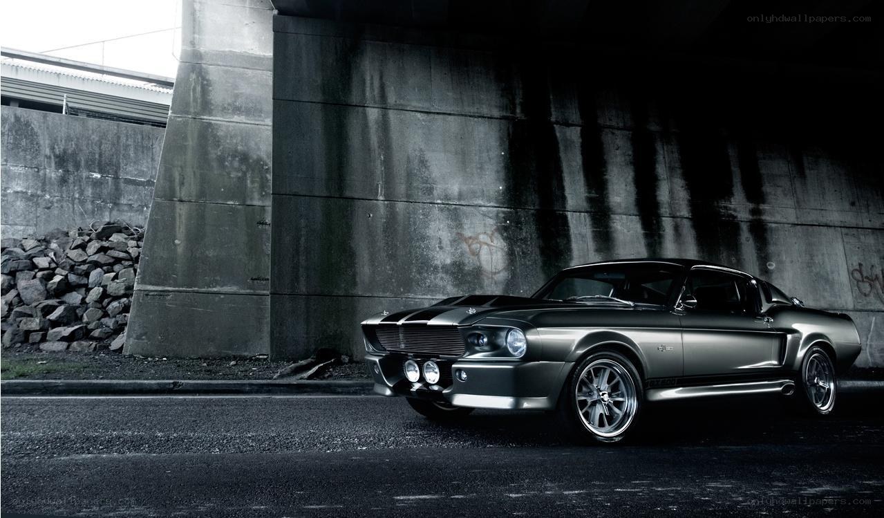Classic muscle car under bridge