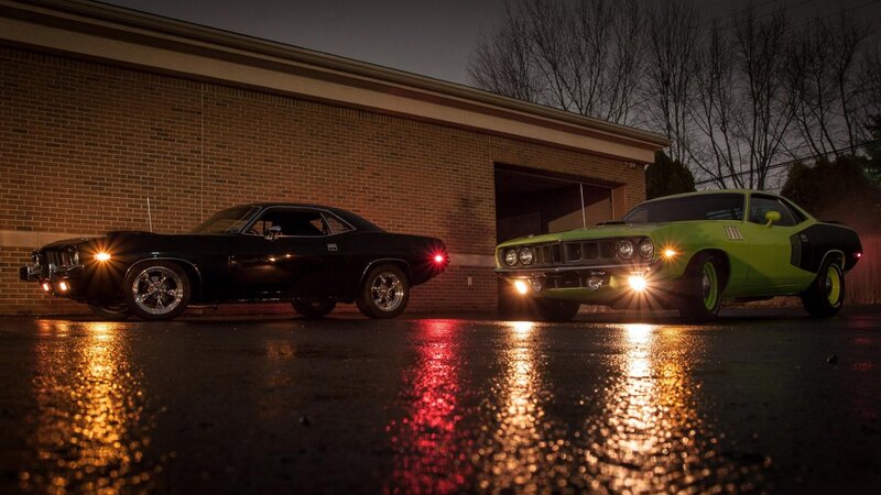 Classic muscle cars at night