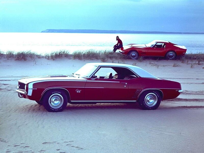Classic muscle cars on the beach