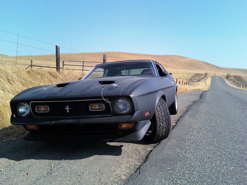 Classic Mustang on a rural road