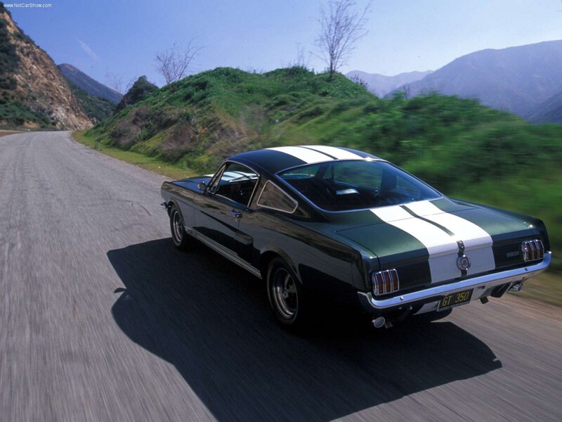 Classic Mustang on a winding road