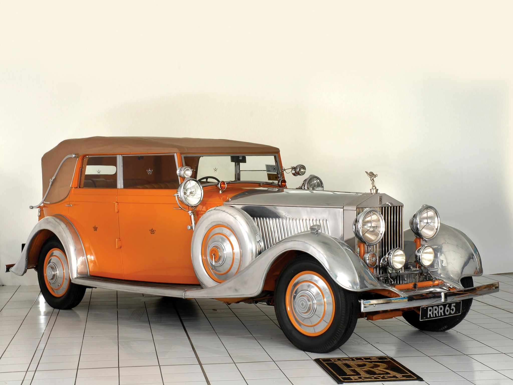 Classic orange Rolls-Royce car