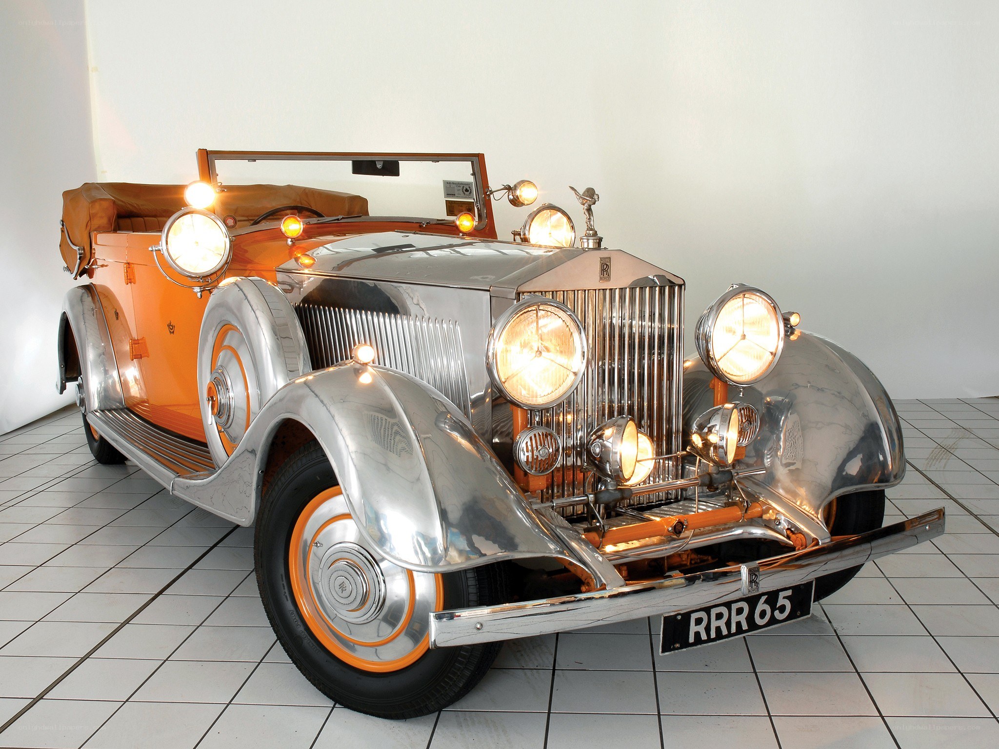 Classic orange Rolls-Royce car