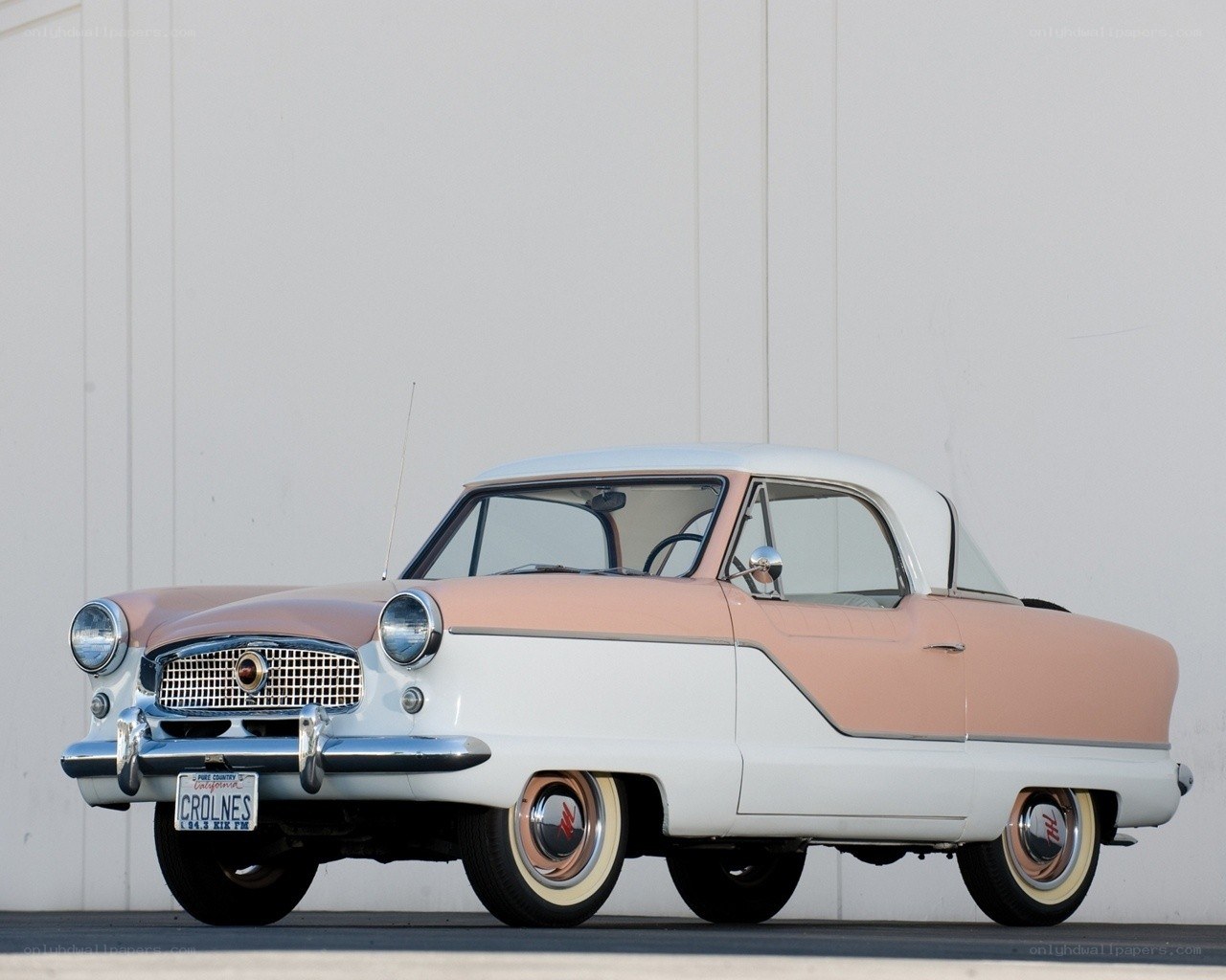 Classic pink and white car
