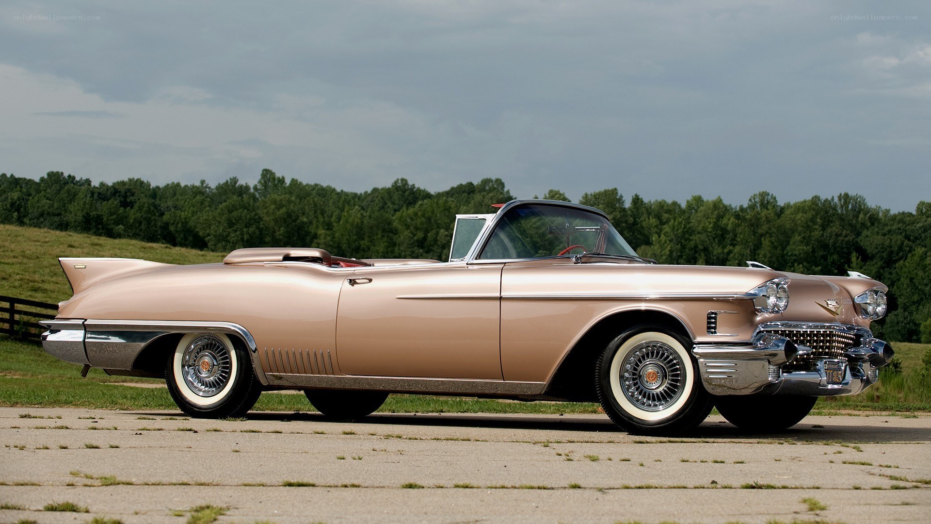 Classic pink Cadillac convertible