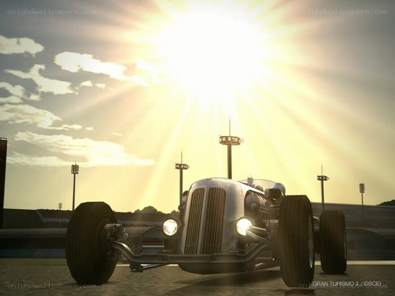 Classic race car at sunset