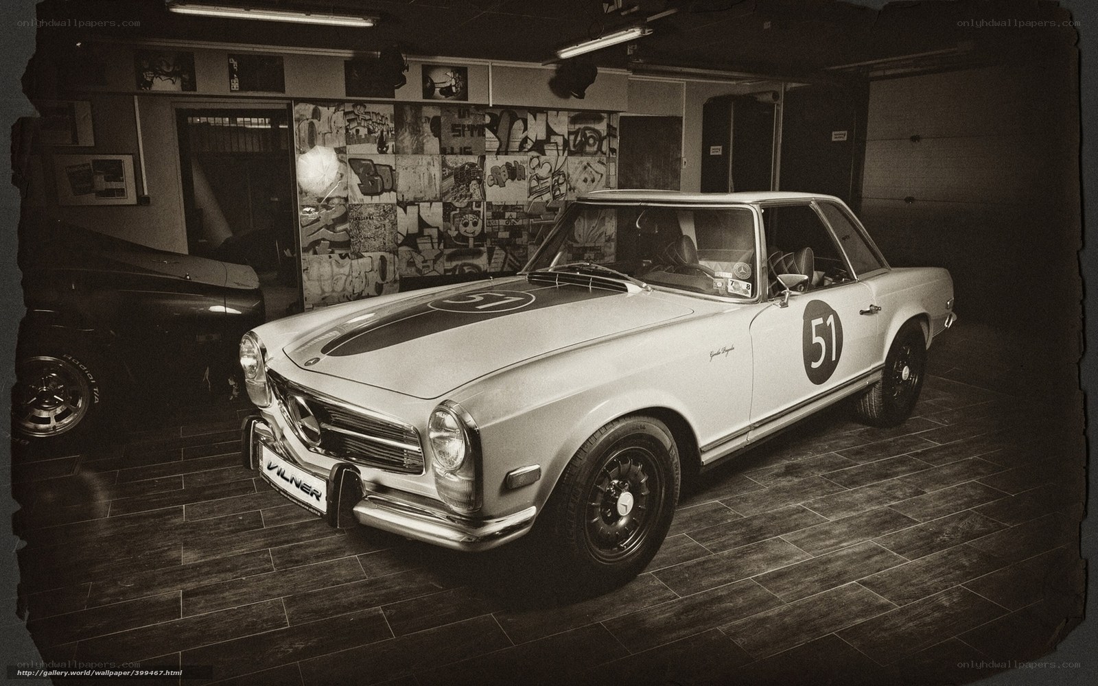 Classic race car in garage