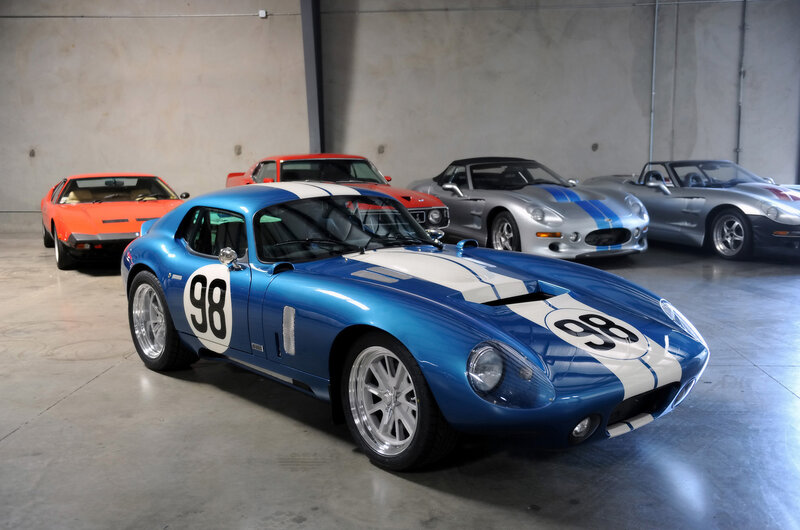 Classic race cars in a garage