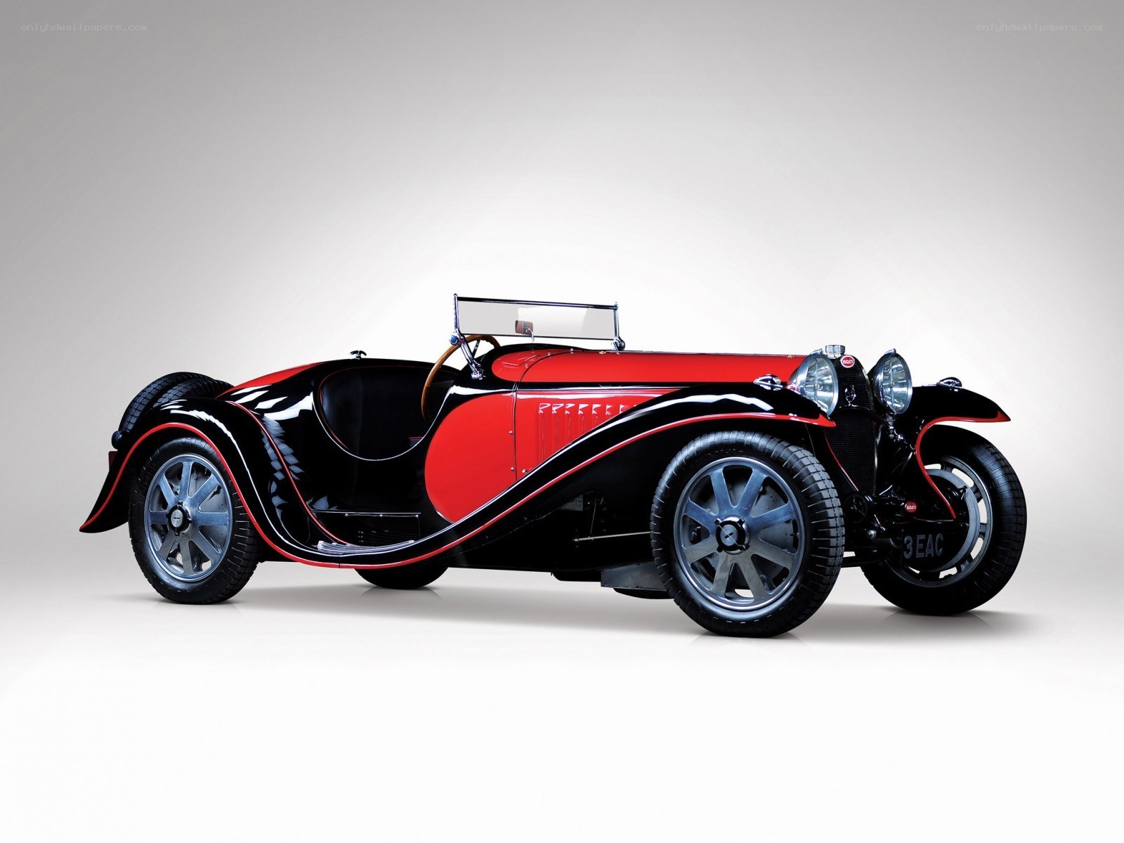 Classic red and black Bugatti car