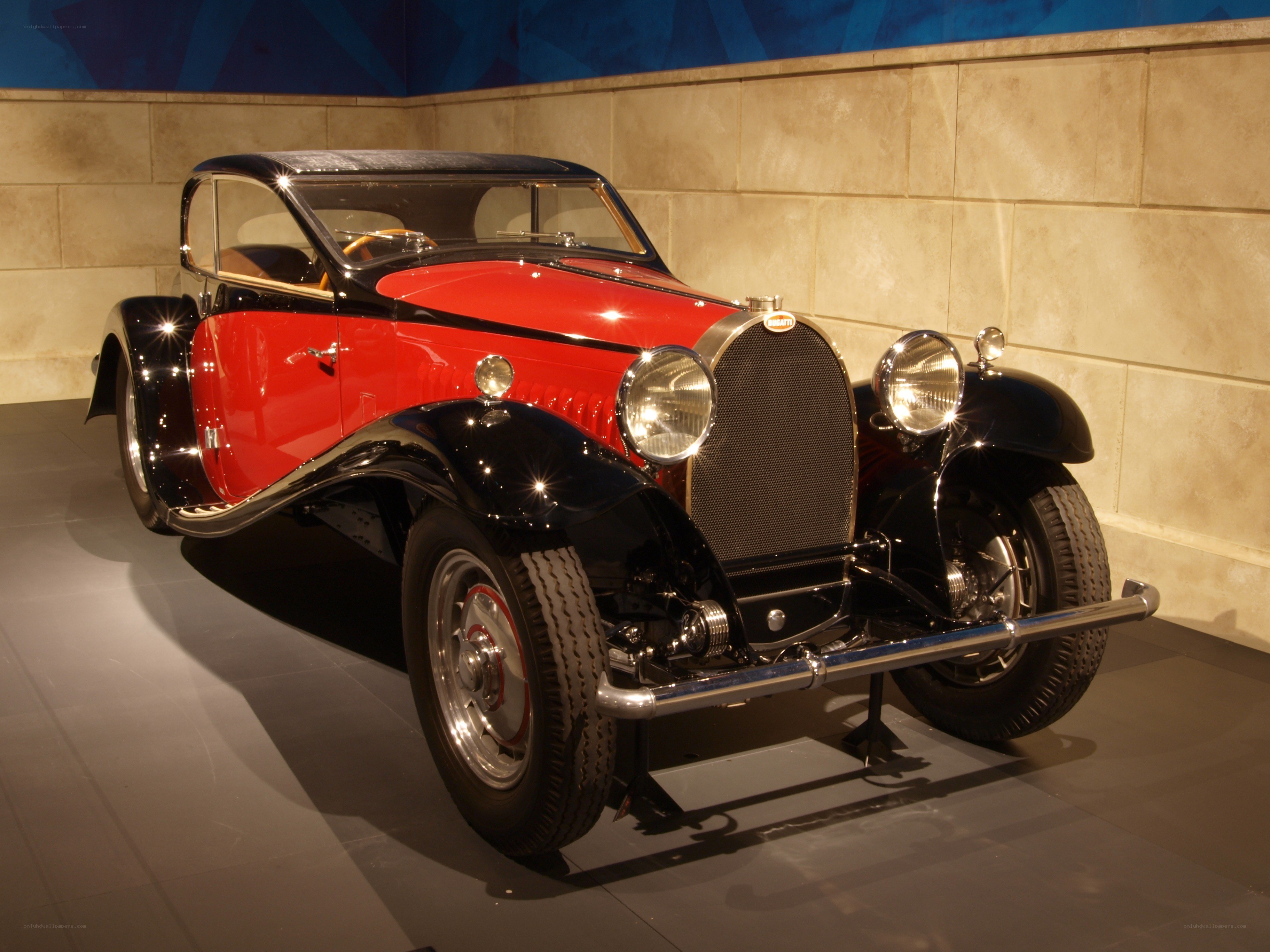 Classic red and black Bugatti car