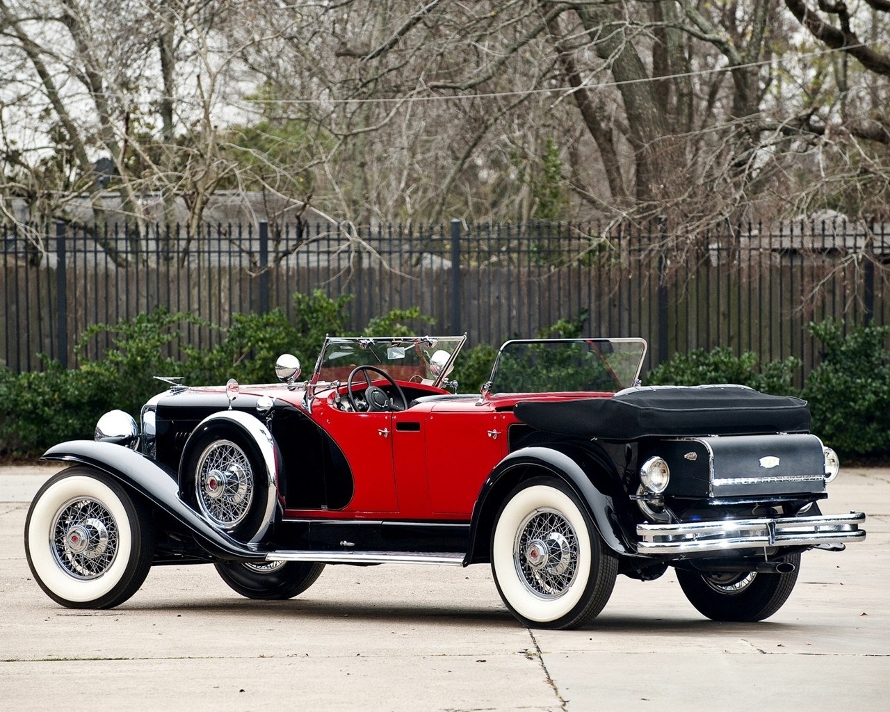 Classic red and black convertible car