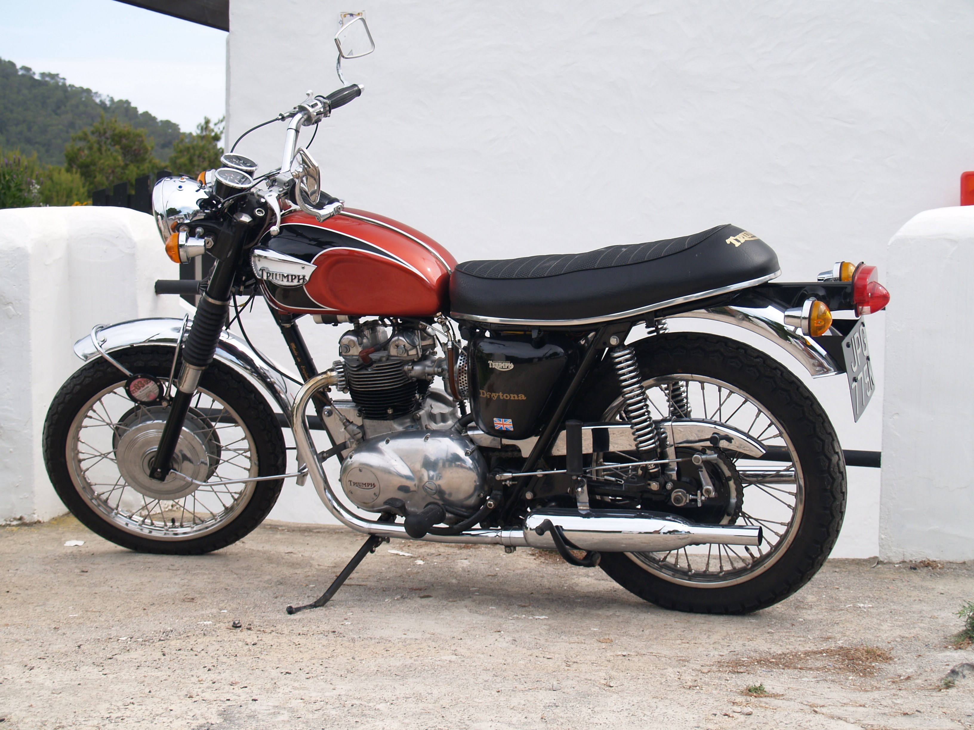 Classic red and black Triumph motorcycle