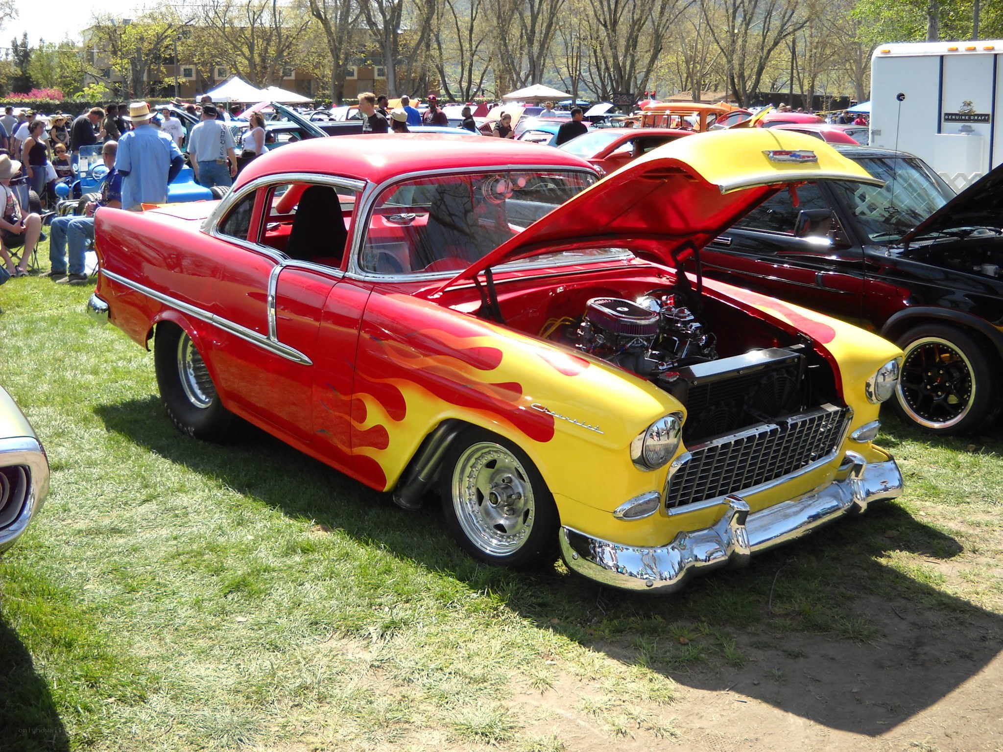 Classic red and yellow car at show