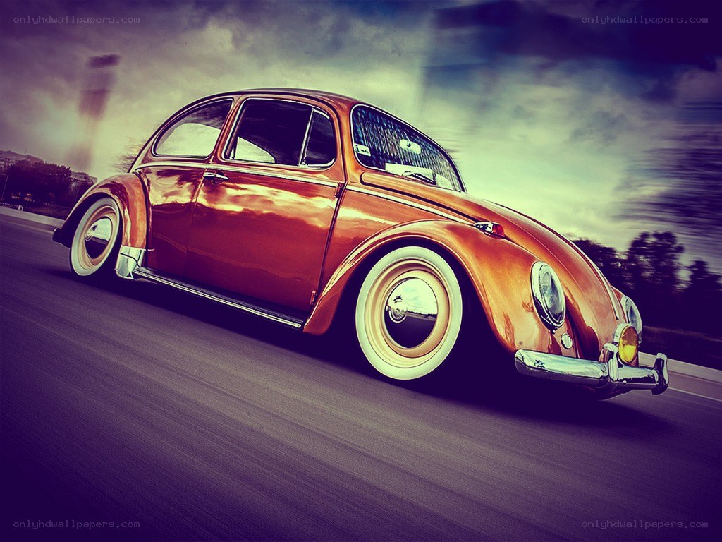 classic red beetle in motion