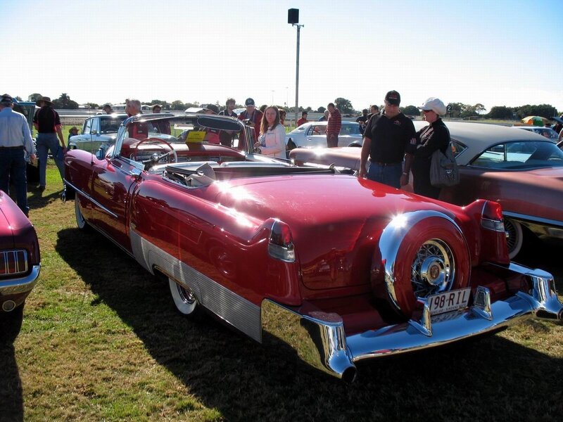Classic red convertible at car show