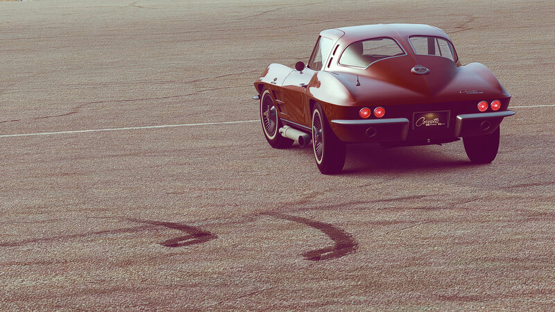 Classic red Corvette on track