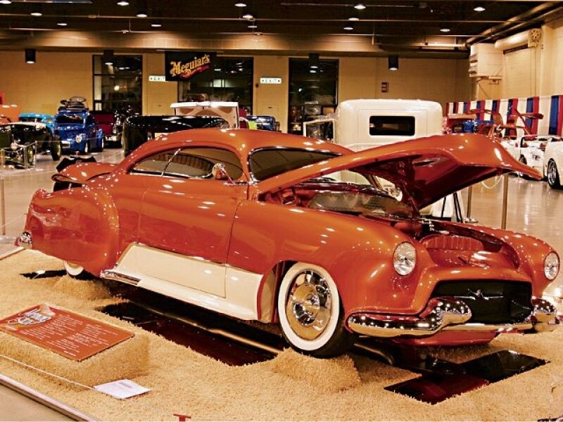 Classic red custom car on display