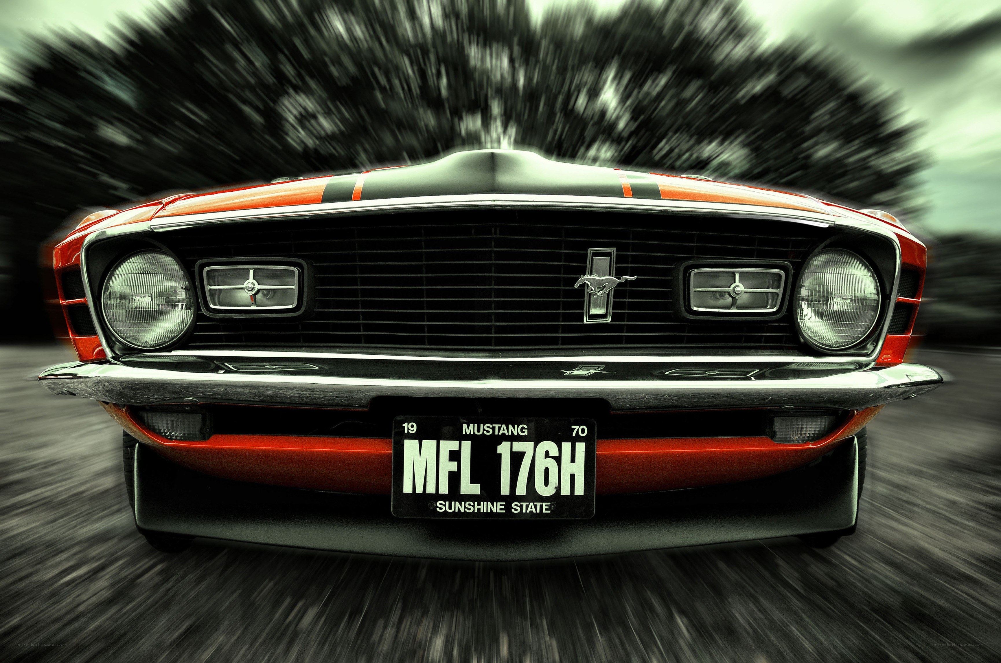 Classic red Mustang in motion