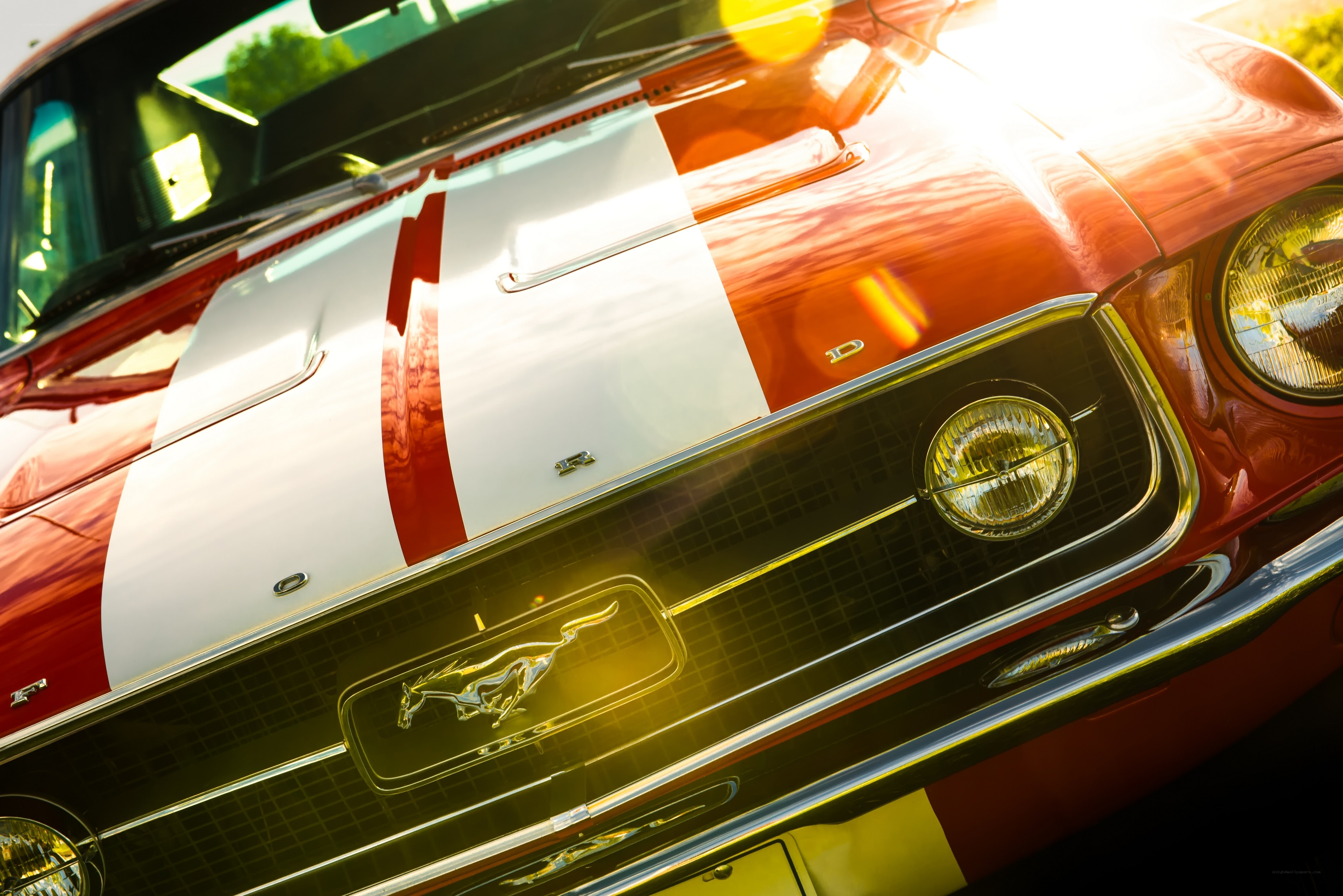 Classic red Mustang with stripes