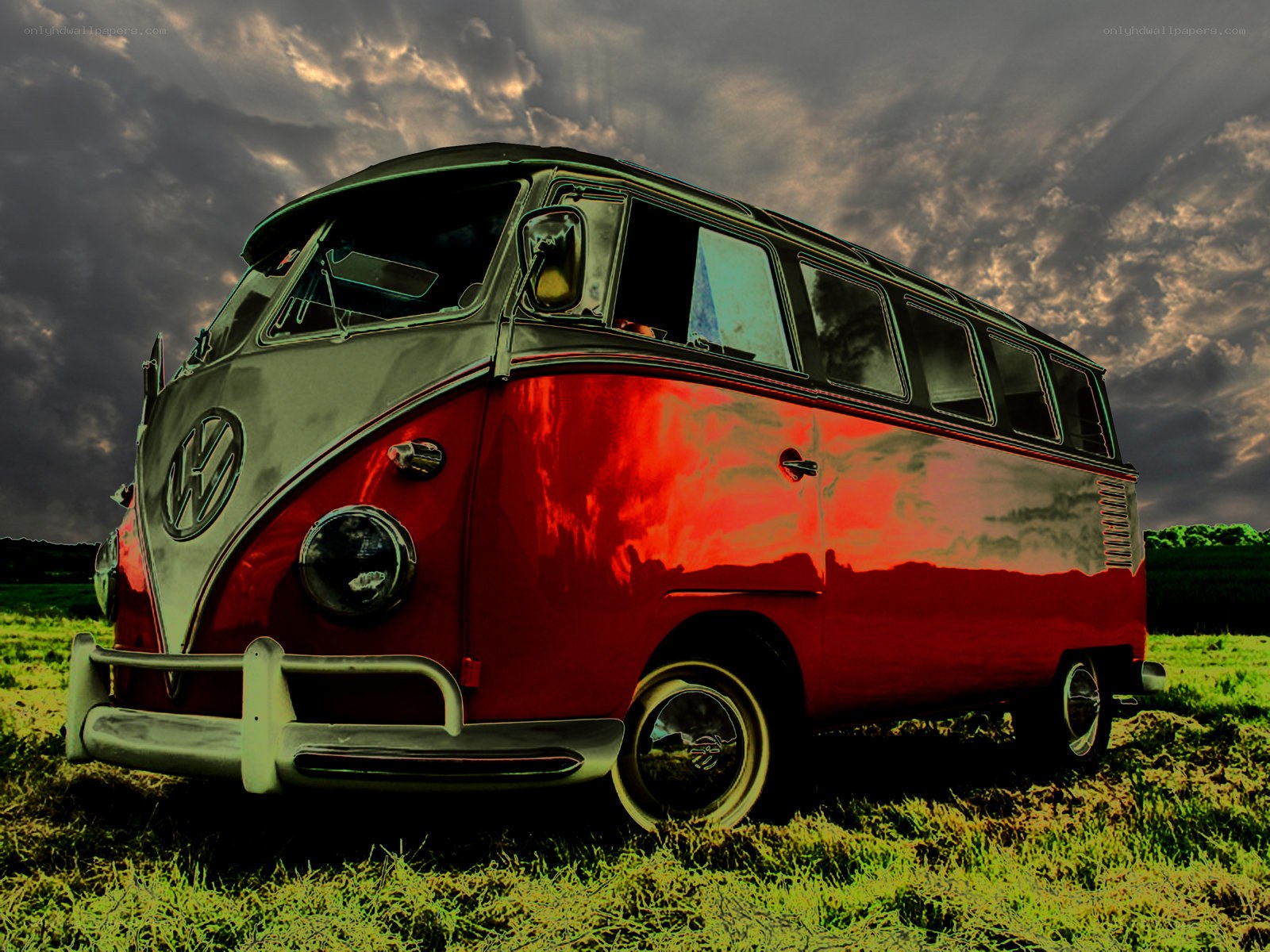 Classic red VW bus in field