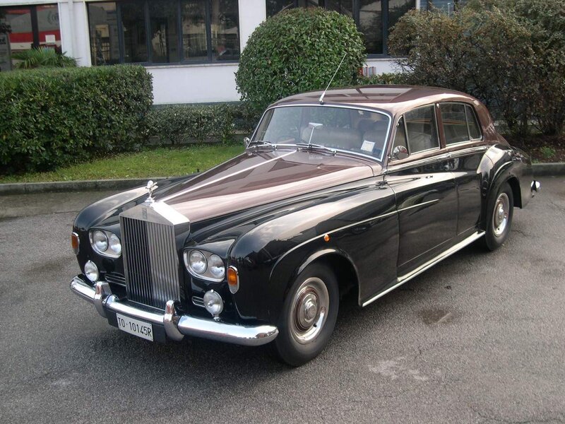 Classic Rolls-Royce parked outside