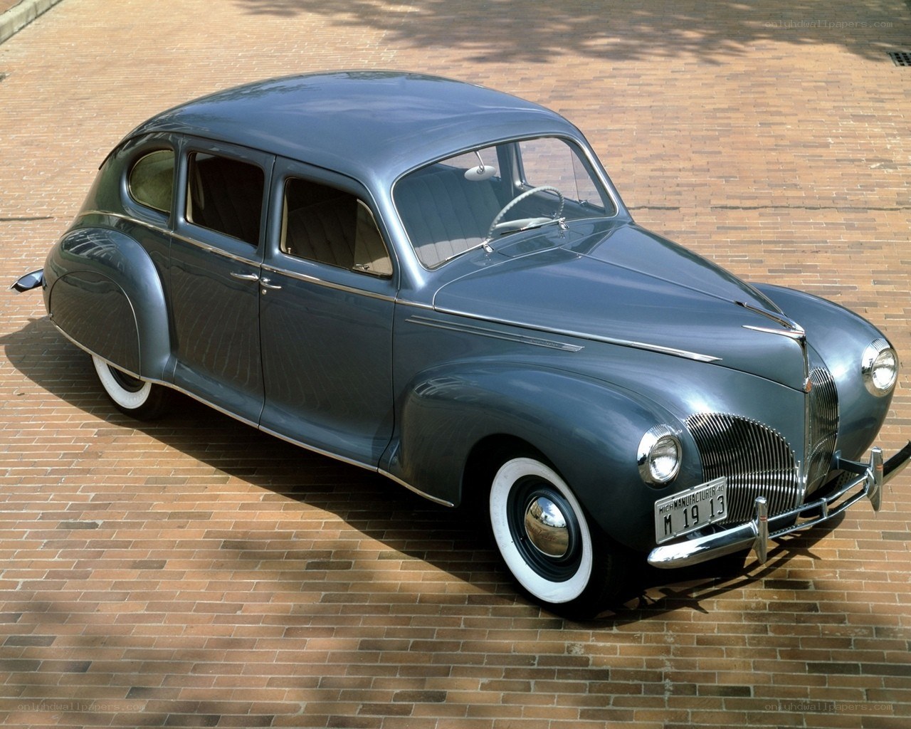 Classic sedan on brick pavement