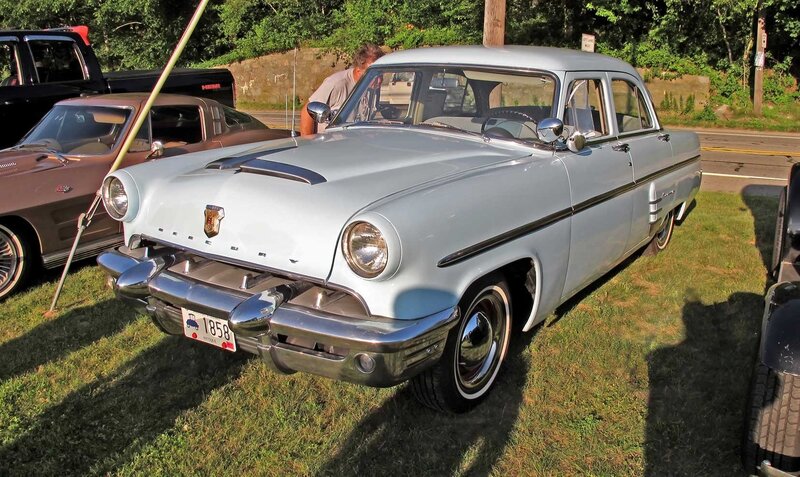 Classic silver car at a show