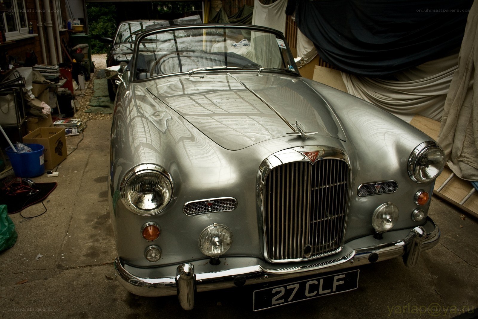 Classic silver car in garage