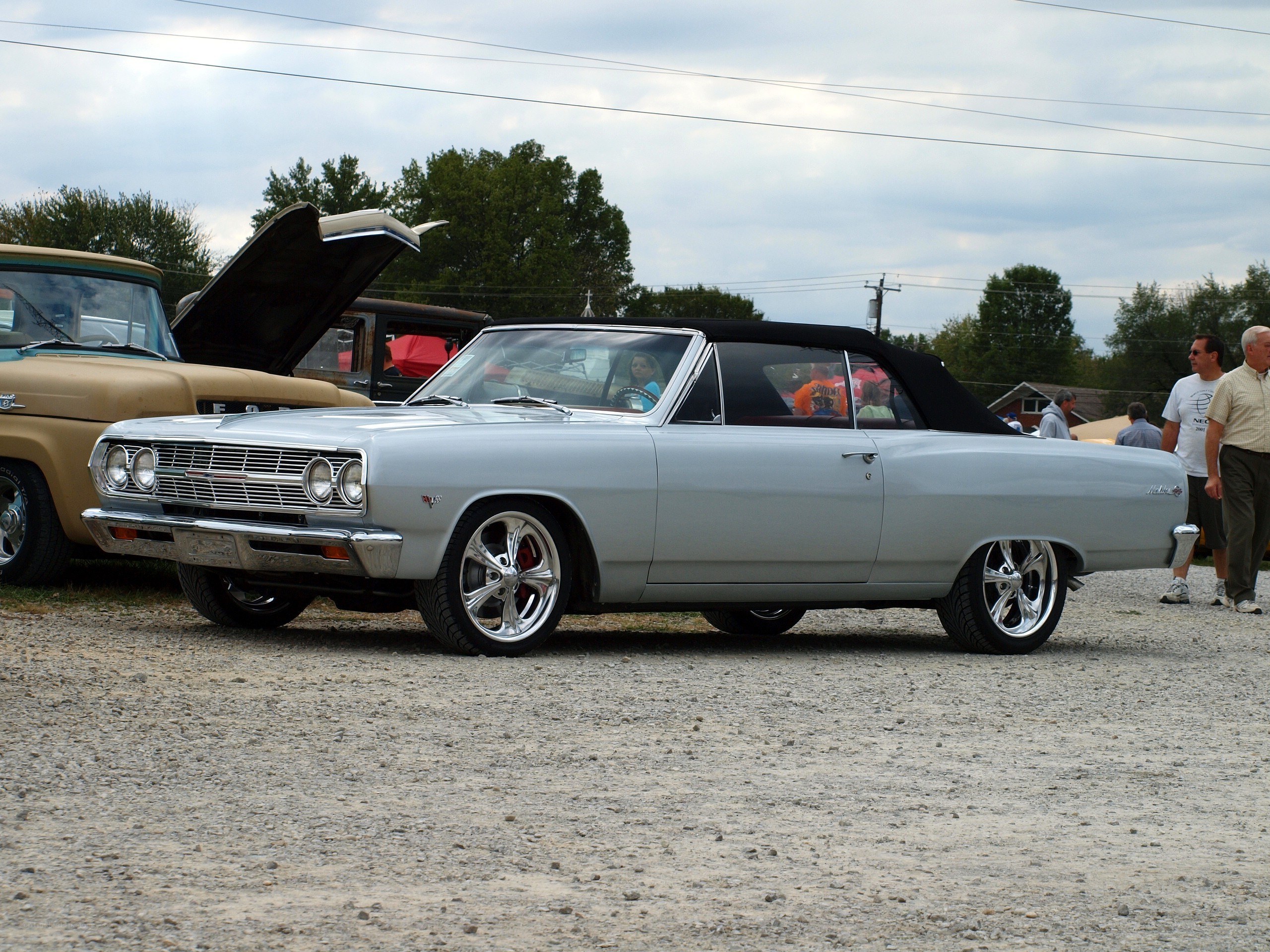 Classic silver convertible at car show
