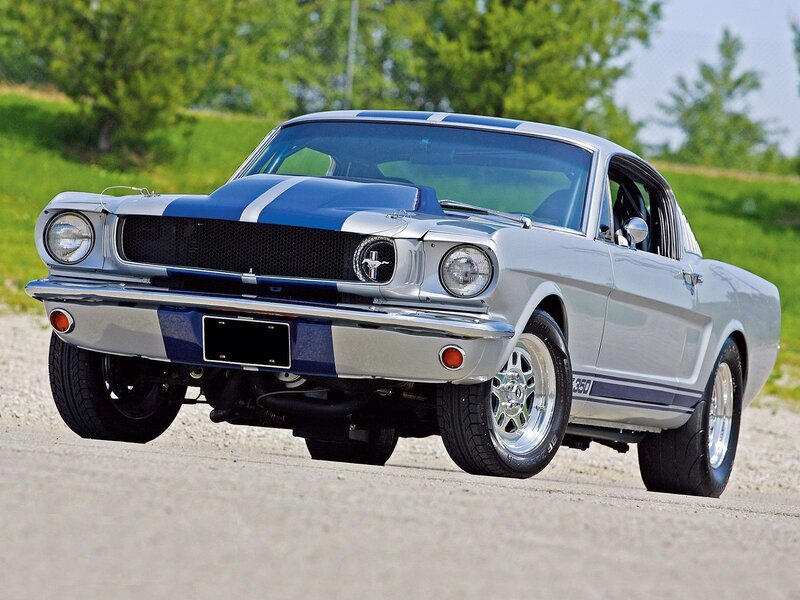 Classic silver Mustang with blue stripes