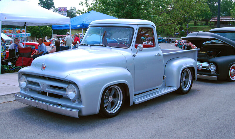 Classic silver pickup truck at car show